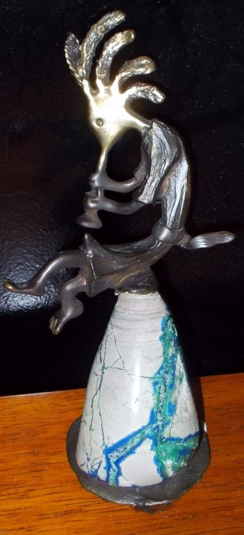 Kokopelli Statue: An artist, Michael Story, created this unique statue of Kokopelli sitting on a malachite and azurite mineral rock. This piece came from Jerome, Arizona and is in mint condition. It stands at 7.5 inche