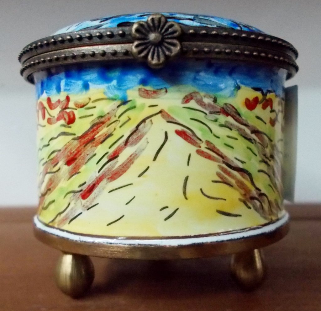 Stamp Dispenser: Kelvin Chen hinged stamp despenser is approximately 2" tall and is numbered 1235 at the bottom by the artist who hand painted it. The beautiful colors of blues and yellows. Perfect to keep mailing sta