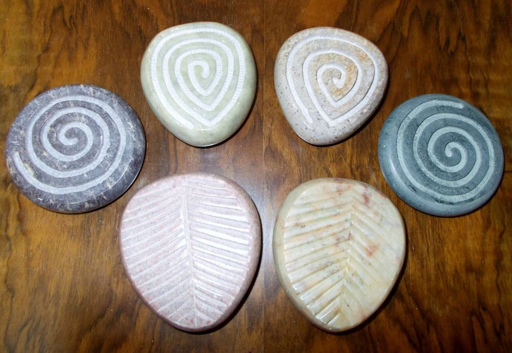 Foot Massage Stones: Six hand carved foot massage stones. Carving on the top of the stones are either swirls or lines.