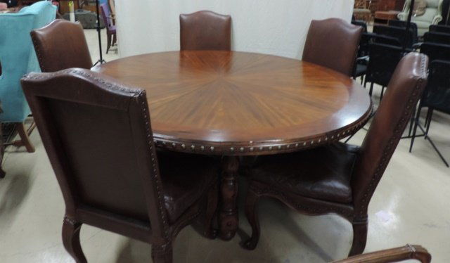 Round Table with Five Leather Chairs: Gorgeous, hand crafted, solid wood round dining table with 5 beautifully made leather leather chairs with rivet accents. Table measures 69" in diameter by 31" high.