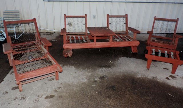Set of out door furniture: This wonderful set of out door furniture needs a little love but has so much potential! Includes a two seated bench with a table, lounger, chair and side table.