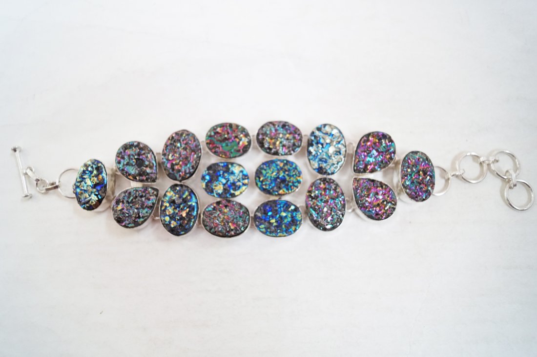 Beautiful Titanium Druzy Silver Bracelet: Beautiful Titanium Druzy Silver Bracelet Weight :66Grams Length ; 7.5 Inch. Metal: German Silver Alloy Stone : Titanium Druzy