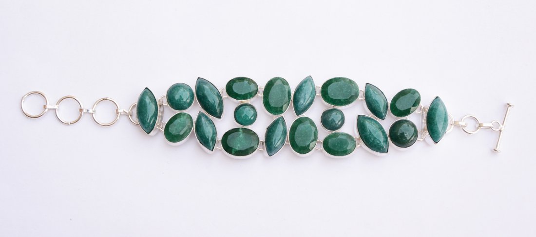 Simulaetd Emerald & Ruby: Beautiful Bracelet with Simulaetd Emerald & Ruby Approx Weight : 30-40 grams Approx Length ; 7.5 Inch Metal: German Silver Alloy Stone :Simulaetd Emerald & Ruby