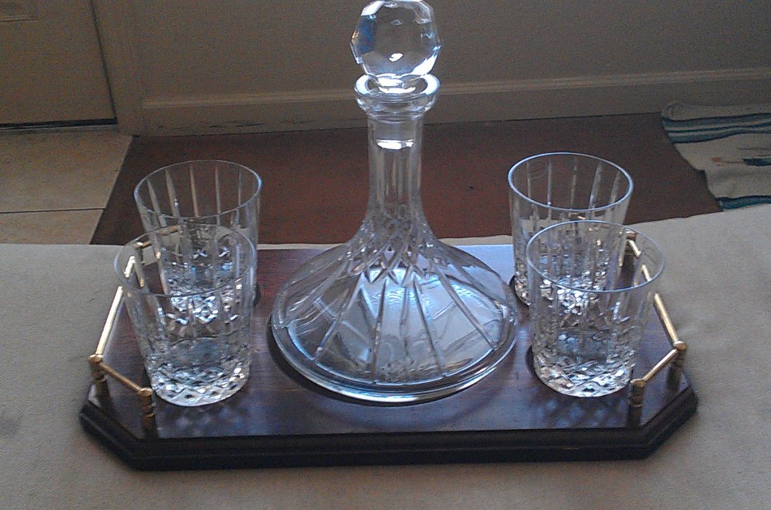 Wedgewood Yougoslavian Crystal Decanter Set: I am pleased to offer this fine Wedgewood crystal decanter set with four glasses and hardwood serving tray with brass handles. This is Yugoslavian crystal, and sailed aboard a luxury motor yacht befor