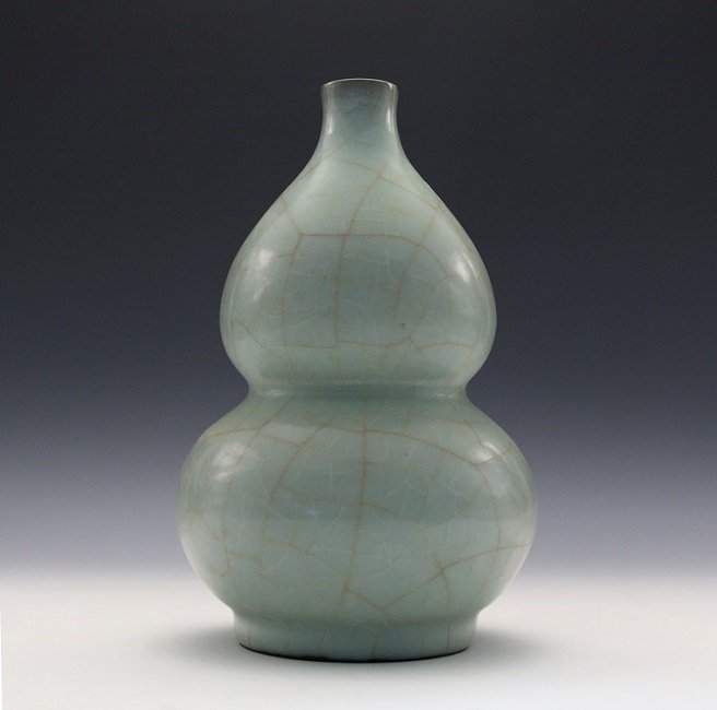 A GUAN-TYPE SKY-CELADON DOUBLE-GOURD VASE (1 of 5)