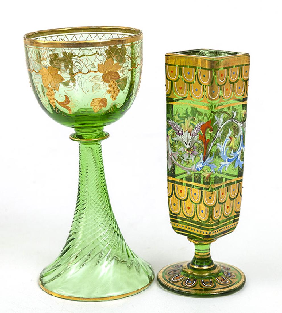 Two Pieces Moser Type Art Glass: Including an enamel decorated bud vase, square body on pedestal base with gilt and polychrome floral painted decoration, 5 1/2" high; and a Rhine wine glass with gilt vintage decoration, 6" high.