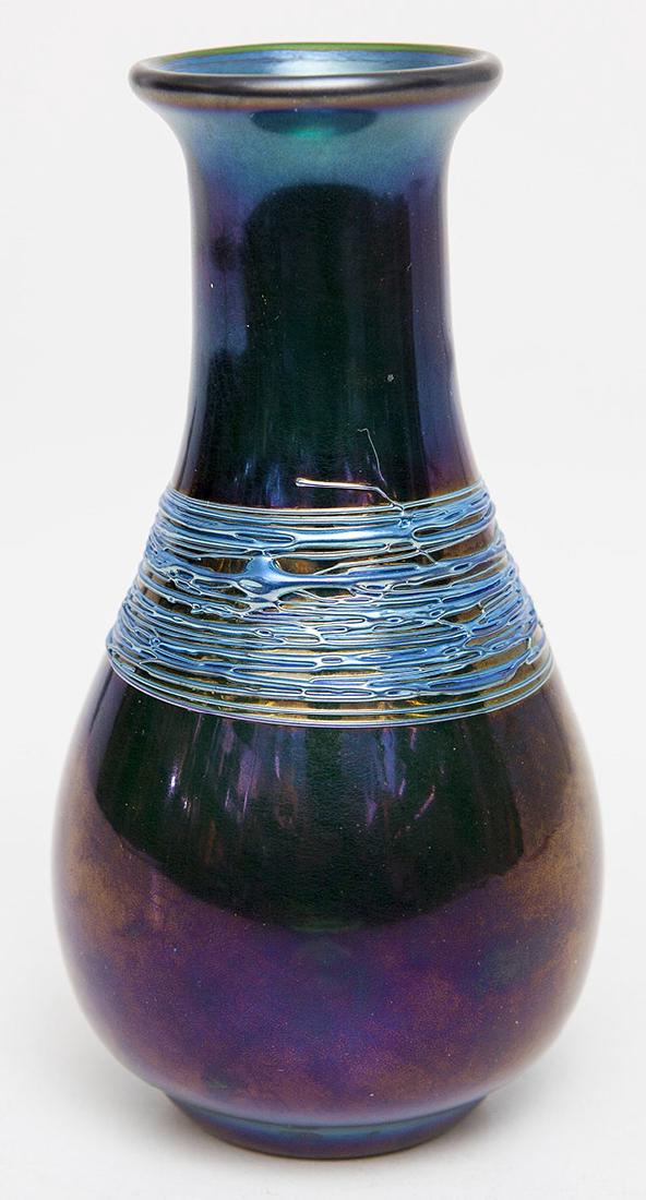 Orient & Flume Art Glass Vase: Baluster form in deep blue iridescent glass with 1" wide band of threading at shoulder, signed on base "Orient & Flume Howell H0031db", 2 3/4" diameter x 6" high.