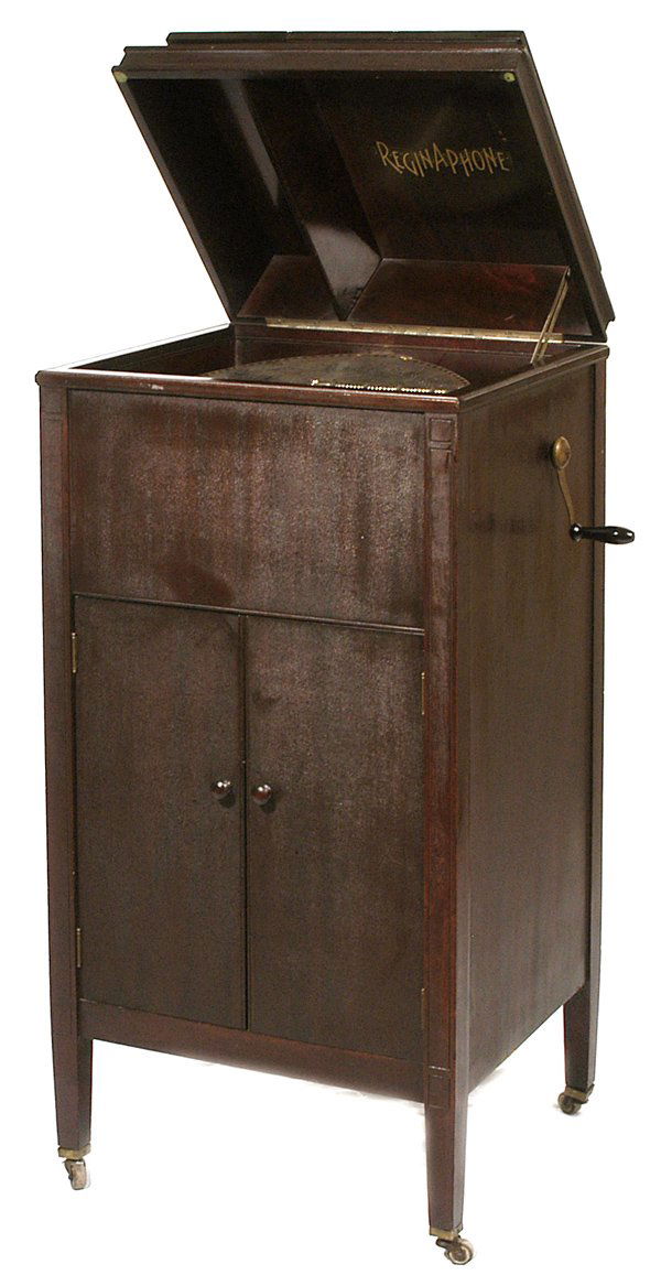 RARE REGINAPHONE UPRIGHT 15 1/2" DISC MUSIC BOX: Style 246 with double comb and original finish mahogany case. A rare machine with only approximately 190 being produced. All styles of inside-horn Reginaphones have great tonal quality and this machin