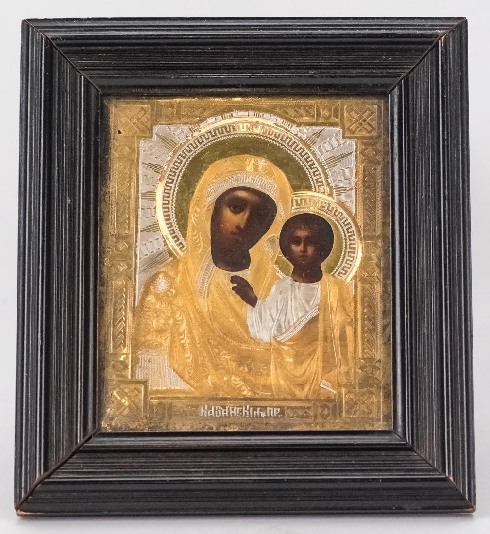 Fine Russian Icon: Oil on wood panel with gilt engraved metal overlay, in ebony frame, 6 3/4 x 7 1/2".