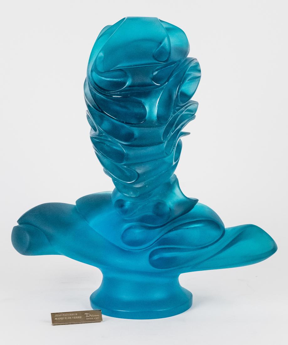 Daum -Jean Faucheur Sculpture: Limited edition entitled, " Masque De Verre," in blue Pate De Verre glass, cast signature on rear, "Faucheur, Daum France 40/275," with gilt brass title block. 16" x 7 1/2" x 16 1/2" high. In original