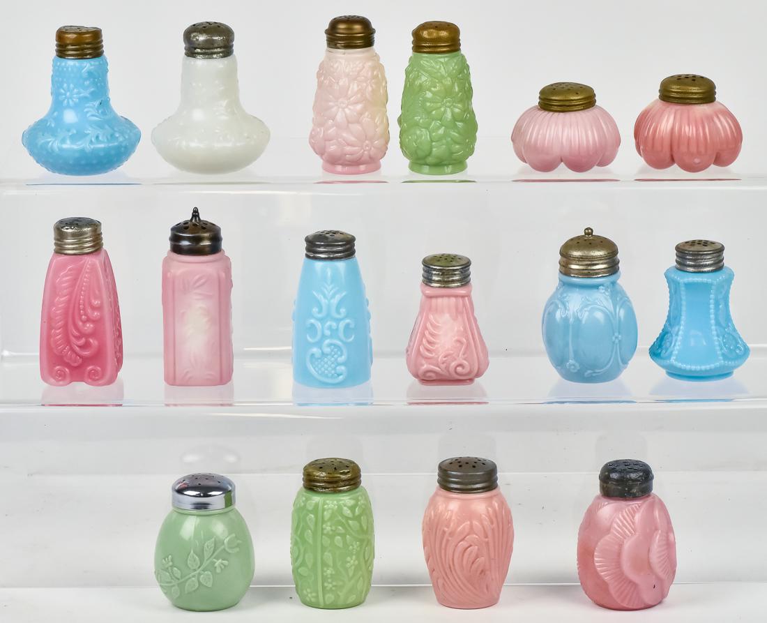 Victorian Art Glass Salt & Pepper Castors: Lot of 16, all in green, pink, blue & white milk glass, including pink Flower Assortment Square, 3 3/4" high; plus pink Scrolled Leaf Square, 3 1/2" high; plus pink Flower Bouquet, 3 1/2" high; plus p