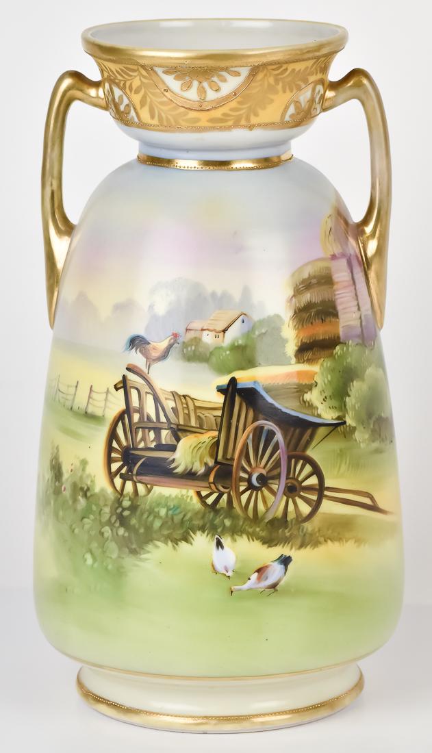 Nippon Vase with Scarce Barnyard Scene: Double handled with wagon and chickens. M in wreath mark. 10" high. Fine Condition.