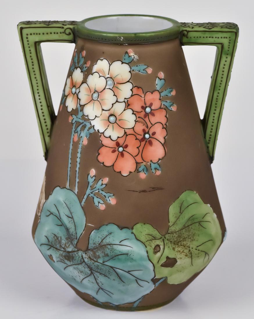 Nippon Vase with Matte Finish: Double handled with florals and enamel wotk. M in wreath mark. 5 1/2" high. Fine condition.