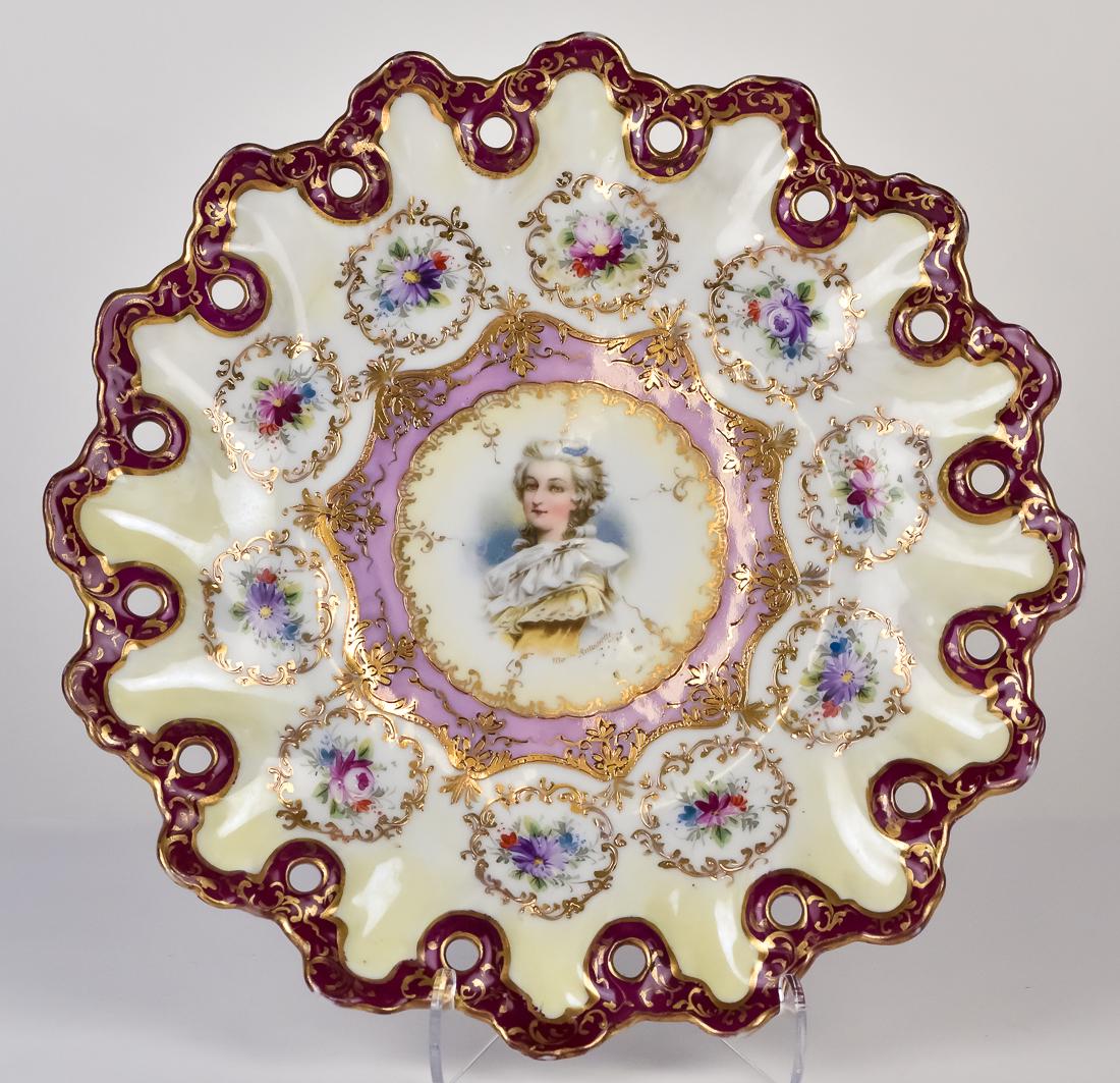 Nippon Portrait Plate with Open Work: Red border with florals highlighted in gold. Unmarked. 10" diameter, Fine condition.