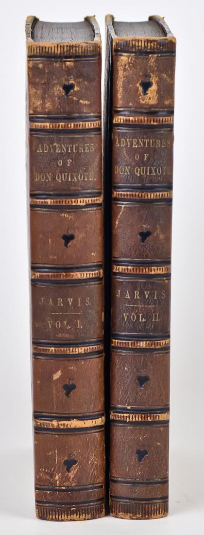 Adventures of Don Quixote: Two volume half leather bound set, circa 1880, printed by Leavitt & Allen, N.Y., illustrated by Tony Johannot, 4to volume with raised leather spine with titles, marbled boards, front paste downs and f