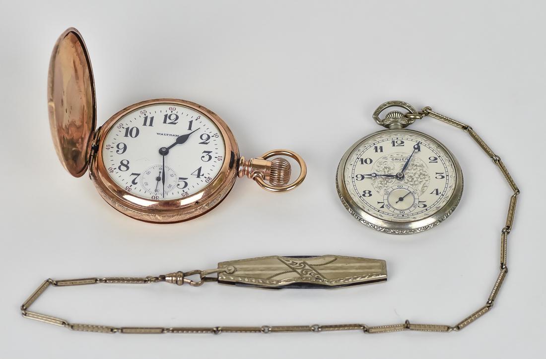 Waltham & Gruen Pocket Watches: Lot of two including a gold filled engraved hunters case marked Waltham on enameled dial with Arabic numerals and seconds dial below, works marked A.W.W. Co./Waltham, Mass., serial number 784142, 2" d