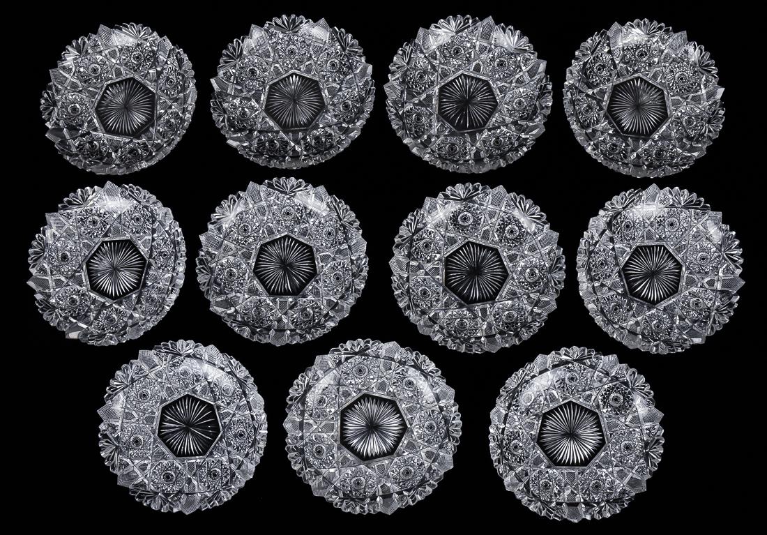 American Cut Glass Ice Cream Plates: Set of 11, American Brilliant Period with saw-tooth lip, fan, nails head and hob star cut sides and sunburst center, 6" diameter. Believe to match previous lot. All appear fine.