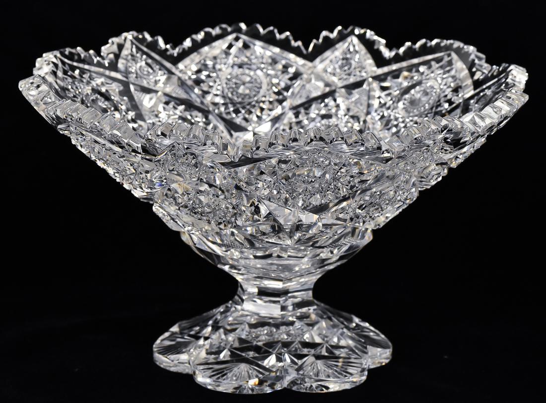 American Footed Cut Glass Compotes: Brilliant period with scalloped and saw-tooth cut lip, hob stars and fan cut body hexagonal pedal form foot with cut fans and central hob star, 10" diameter x 6" high. Fine.