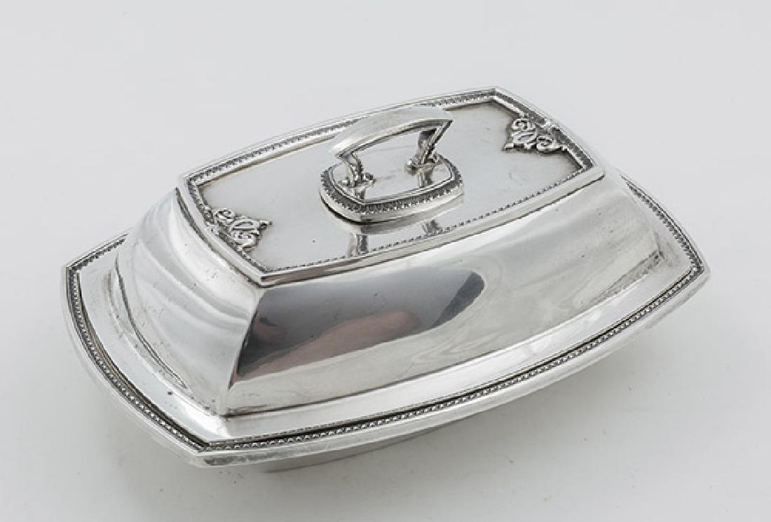 International Sterling Covered Vegetable: Trianon pattern, with relief floral scroll and egg & dart edging, marked International/Sterling/X105-1/6/Trianon, 10 1/2 x 7 1/4 x 5" high, total weight 28.55 ozt.