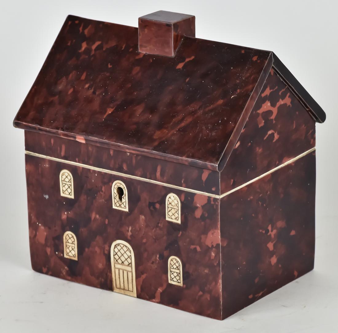 Early Schrimshaw Tea Caddy: Made in the form of a two story center chimney New England home with bone windows and door, opened to two lidded compartments with old silver painted interior, circa 1850, 5 1/2 x 7 1/4 x 7 1/2" high.