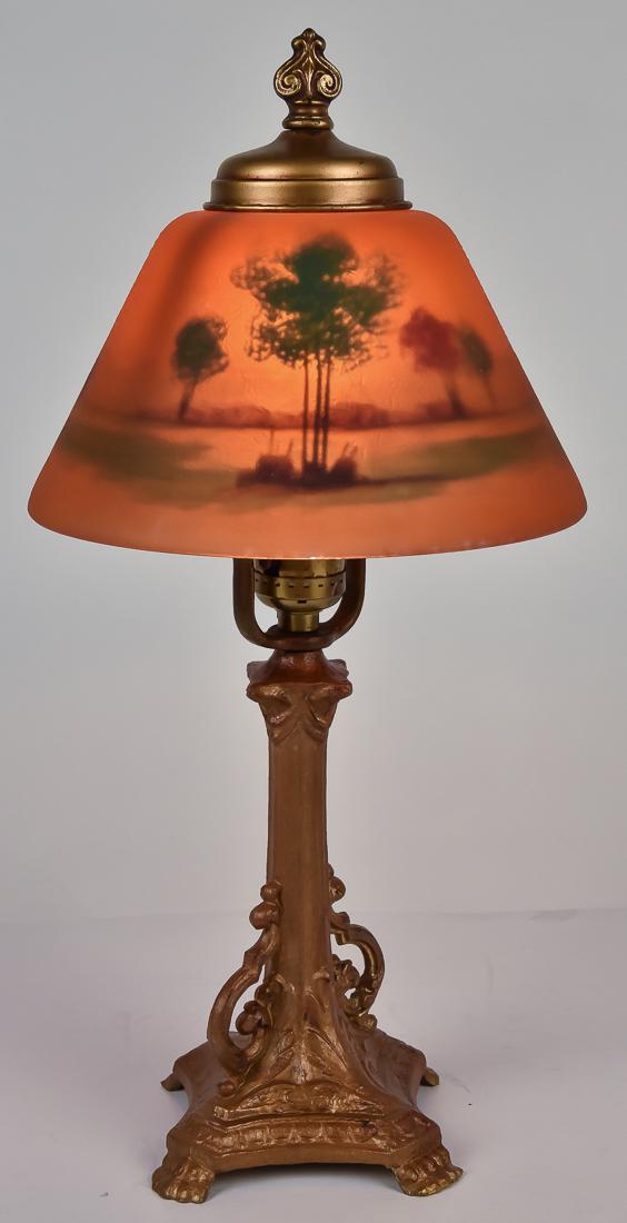 Arts & Crafts Boudoir Lamp: Possibly Pittsburgh or Jefferson, with polychrome painted wooded landscape in fall colors, mounted on original gold painted white metal base with cap, shade is 8" diameter x 4 1/2" high, lamp is 16 1/