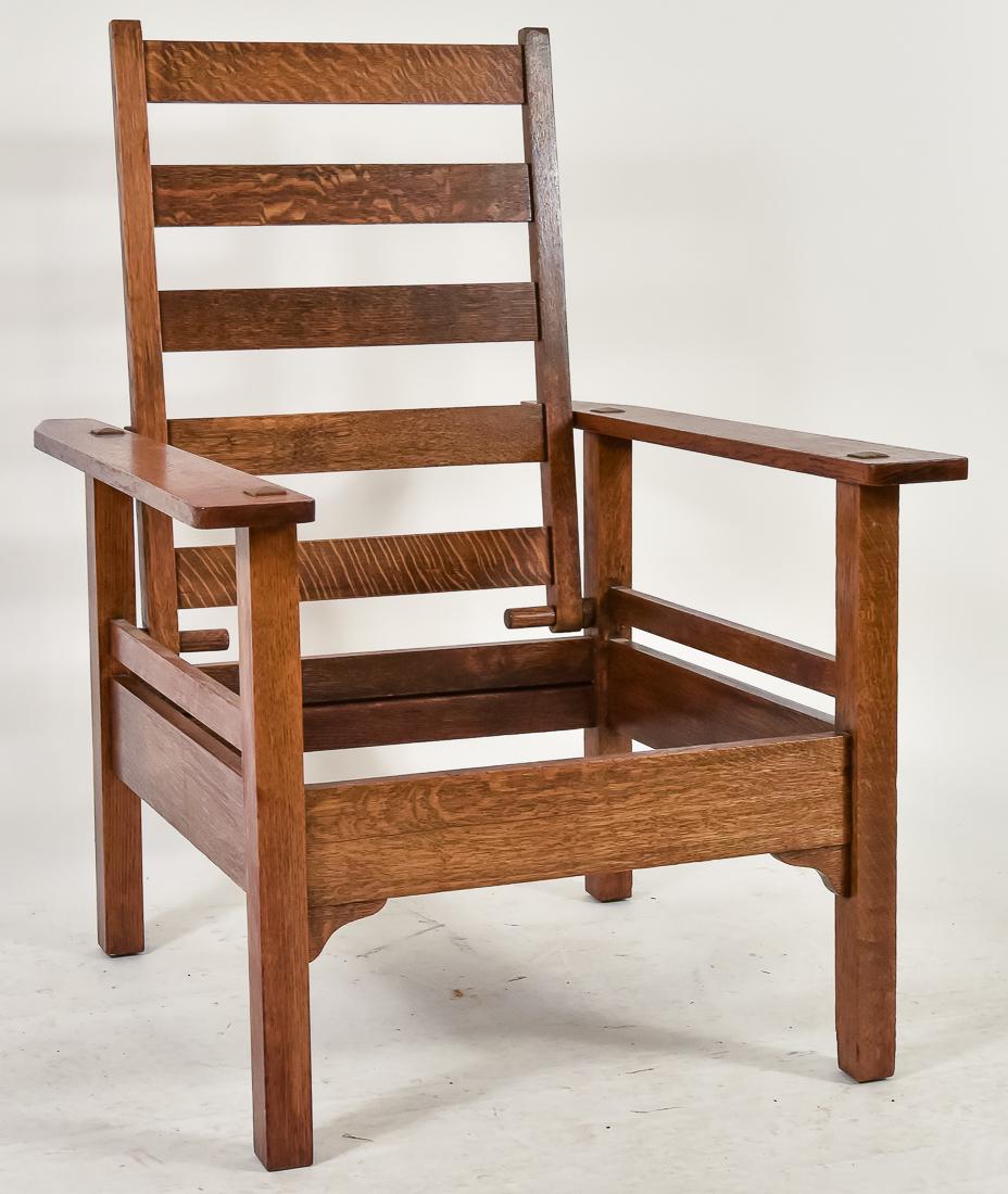 Stickley Brothers Morris Chair: Oak, with mortised through posts and horizonal slat sides, original round seat rest posts, unsigned,older refinish, very good condition, 42" high x 30" wide x 34 1/2" high.