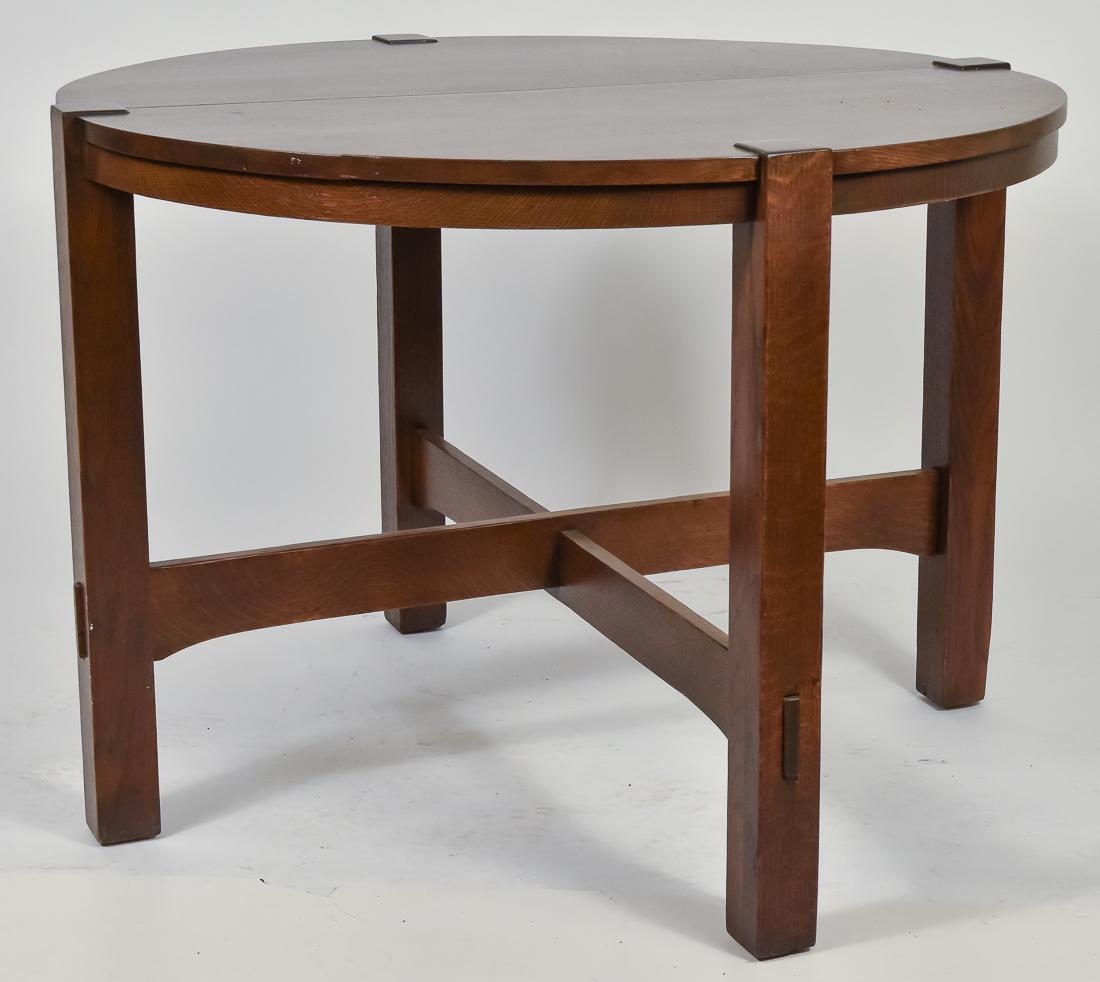 Stickley Brothers No. 130 Large Round Lamp Table: Oak, with square legs and stacked mortised through cross arched stretcher, very good old refinish, good condition, unsigned, 29 1/4" high x 40" diameter.