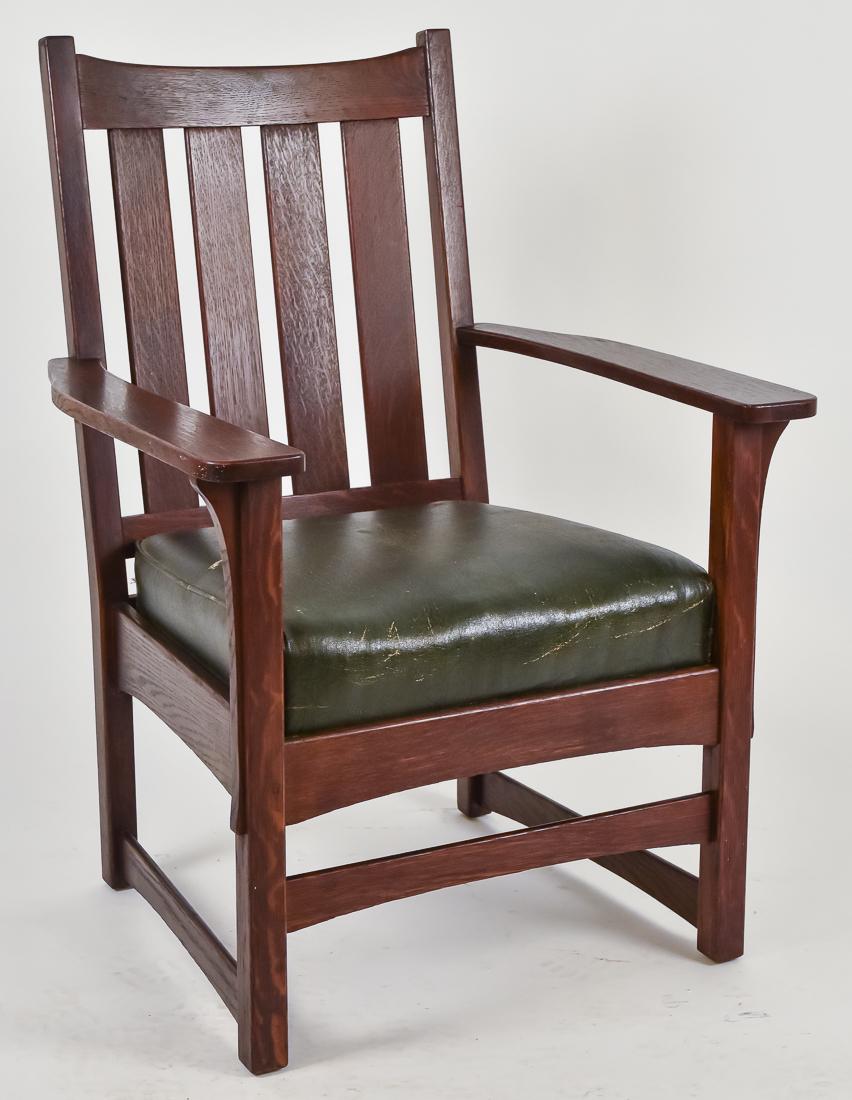 Large Lifetime Armchair: Oak, four vertical slat back and arched stretchers, original green leather seat, signed with printed paper label, 40" high 28" wide 25" deep, seat 18", in excellent original finish.