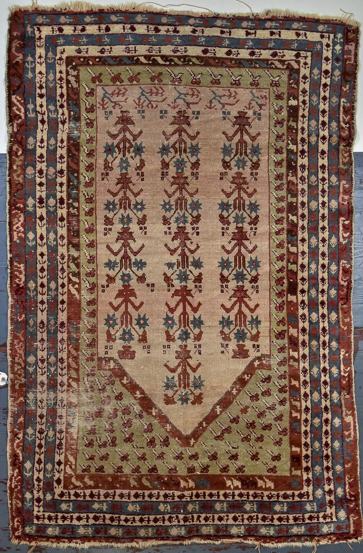 Antique Persian Prayer Rug: Estate hand woven with ivory field and floral designs, with seven borders, 49 x 76".