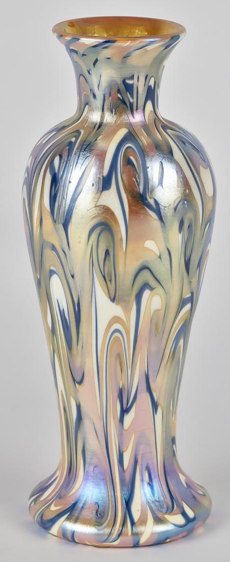 Durand King Tut Art Glass Vase: King Tut pattern with gold liners, baluster form with flared lip, ground and polished pontil, unsigned, 3 1/2" diameter x 9 1/4" high. There is on small blister on side in making. Third photo middle l