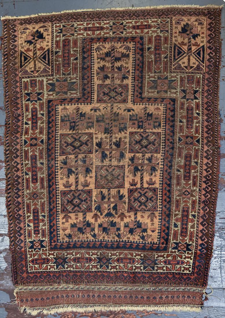 Antique Persian Prayer Rug: Estate hand woven and very unusual in that it tapers towards the rear of the rug, stylized floral with birds and other animals in blue, red and earth tones, 40" wide at top x 33" wide at base x 54" lo