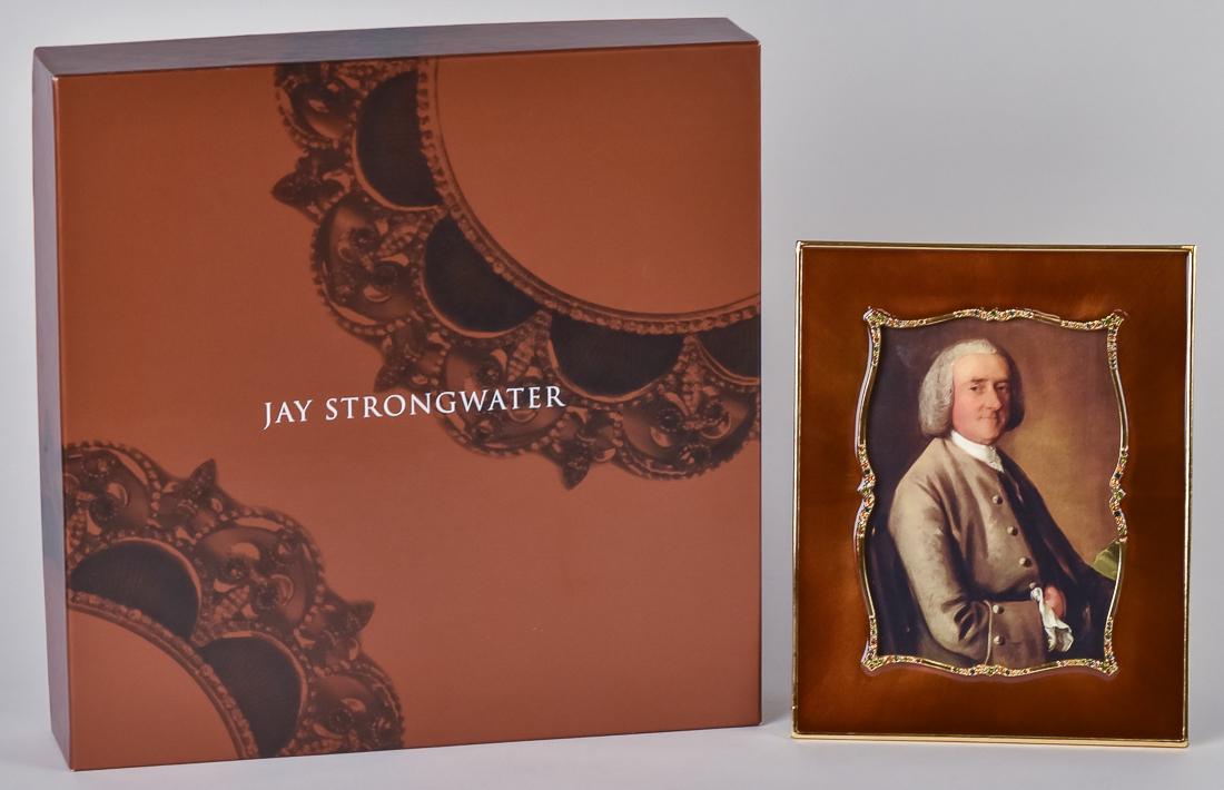 Jay Strongwater Enameled Frame in Box: Amber engine turned ground with gilt surround inset with colored gems, kick stand back, stamped Jay Strongwater, also with enamel decoration, 7 x 8 3/4" in fitted box with felt bag and screw driver to