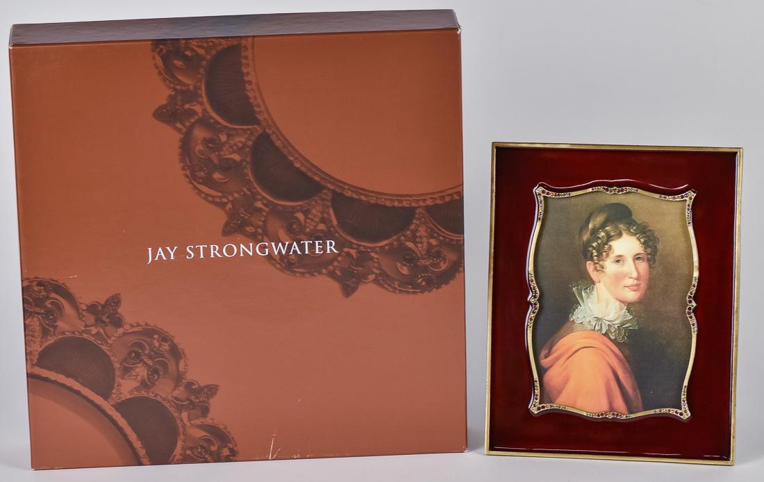 Jay Strongwater Enameled Frame in Box: Red engine turned ground with gilt surround inset with colored gems, kick stand back, stamped Jay Strongwater, also with enamel decoration, 7 x 8 3/4" in fitted box with felt bag and screw driver to m