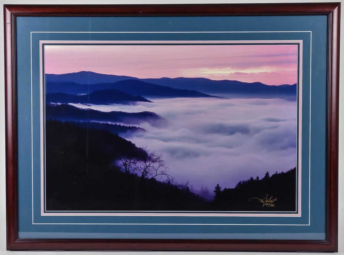Ken Jenkins Landscape Photograph: Entitled Beneath The Smoke, ink signed lower right and numbered 062/400. Colored photograph of Smokey Mountains at sunset with mist hanging in valley, 19 1/2 x 29 1/2" sight, matted and framed, 29 x 3