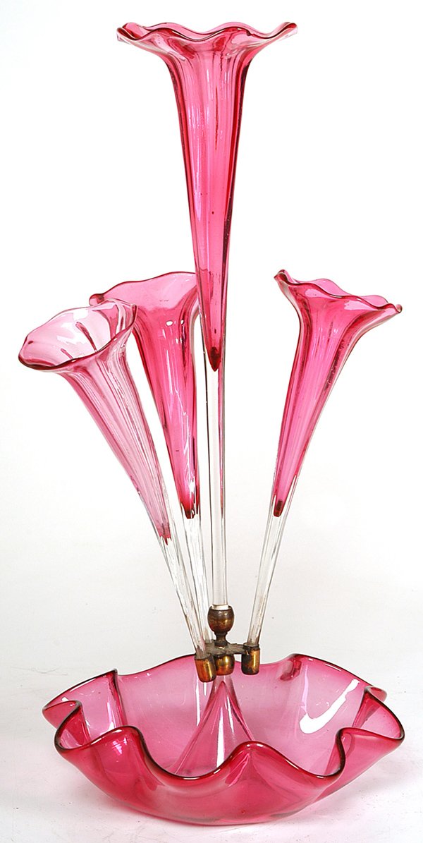VICTORIAN CRANBERRY EPERGNE: One 16" bud vase and three 10 1/2", resting on ruffled bowl. One small chip to center vase, otherwise fine condition. 22" h. EST. $200. - $400.