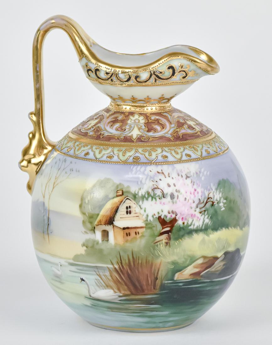 Nippon Scenic Ewer: Nice gold work. Nippon-era English backstamp. 6 1/2". Good condition.