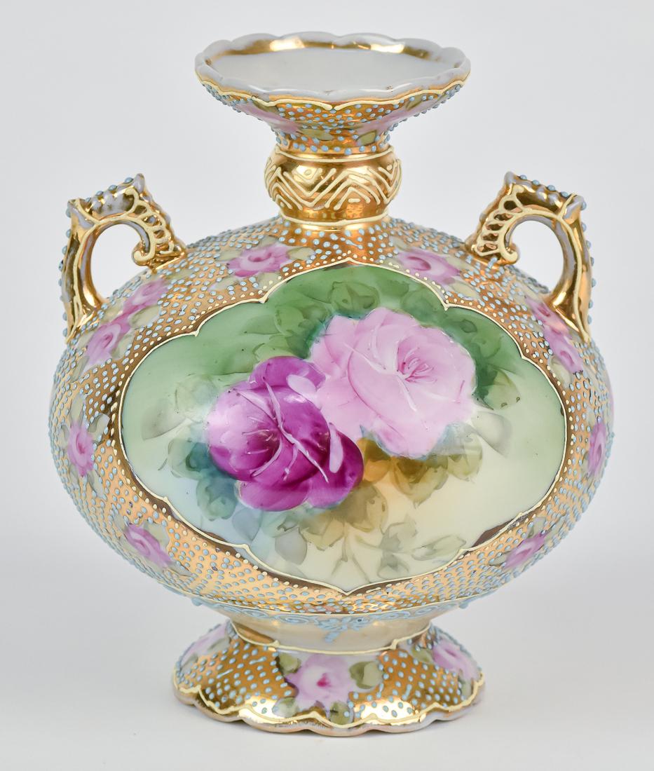 Nippon Vase with Beadwork: Double handled with roses. Unmarked. 6 1/2". Good condition.
