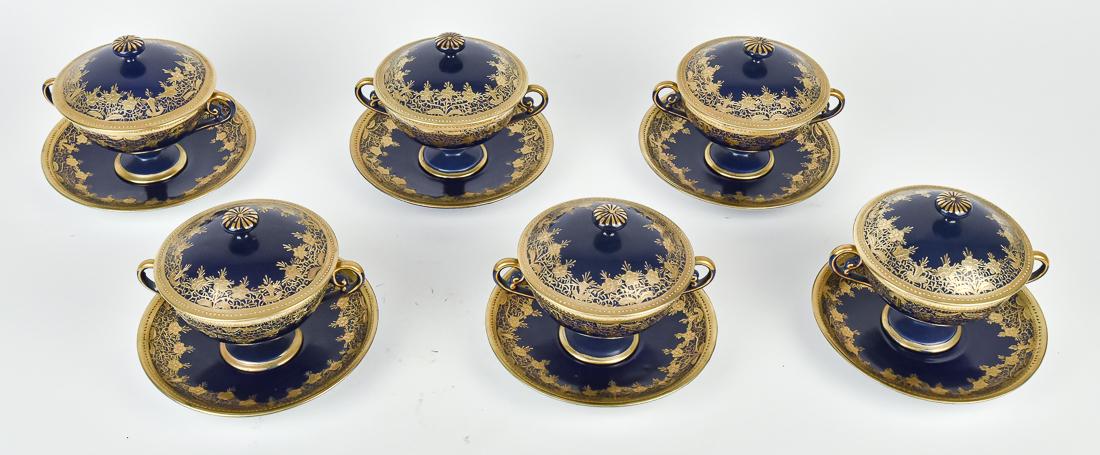 Set of Six Cobalt Blue Covered Boullion Cups: Each with under plates. Double handled with bright gold decoration. 4 1/2" x 6". Nippon Pagoda backstamp. Good condition.