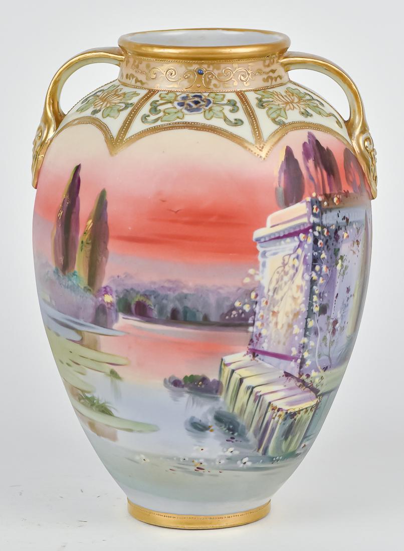 Nippon Scenic Vase: Double handled with nice color. M within wreath backstamp. 10" high. Good condition.