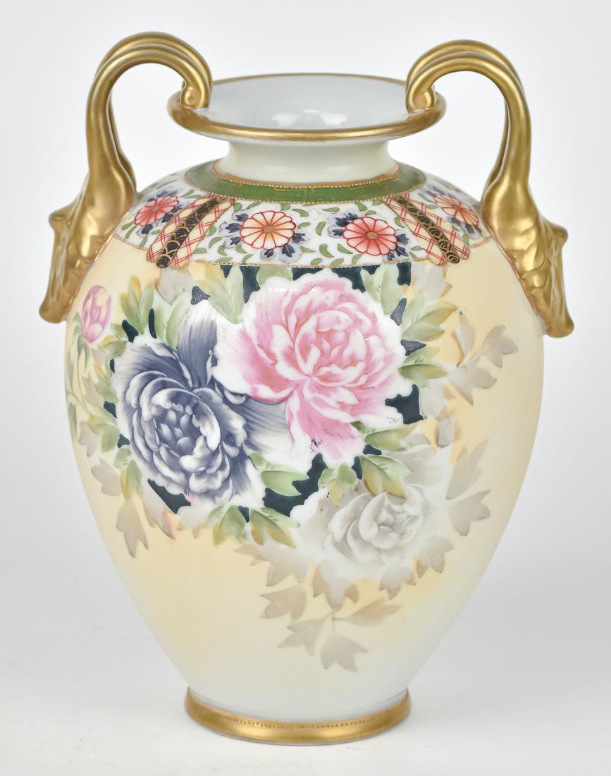 Nippon Vase with Floral Decoration: Four handles. M within wreath backstamp. 8 3/4" high. Good condition.