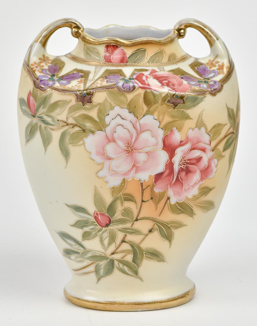 Nippon Vase with Floral Decoration: Double handled. M within wreath backstamp. 8" high. Good condition.