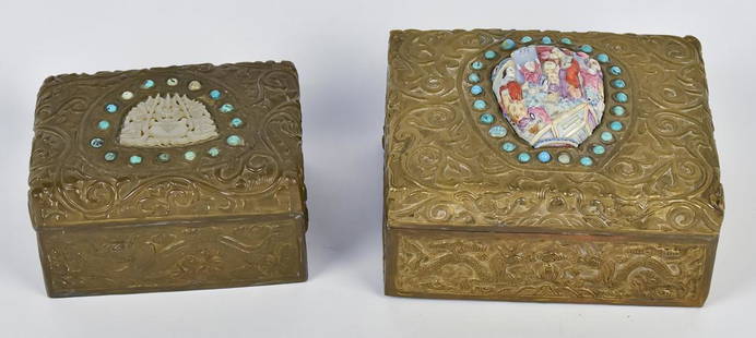 Two Gem Set Chinese Desk Boxes: Both circa 1st quarter of 20th century, with repousse scrolled floral and dragon decoration. Each with ring of torquoise gems surrounding central mount of lid with larger having an early high relief