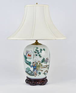 Chinese Porcelain Ginger Jar Lamp: 19th century with beautifully polychrome painted figures in landscape with long Chinese inscription on reverse, 7" diameter x 10 1/2" high, mounted on lotus form teal base, with silk shade, total