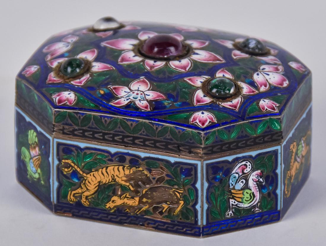 Enameled Silver Mogal Snuff Box: Octagonal woth domed jeweled hinged lid with floral enamel decoration, sides with tigers, elephant, camel & birds, base engraved with stylized flora and interior in gilt, 2 1/4 x 1 7/8 x 1 1/8" high. 