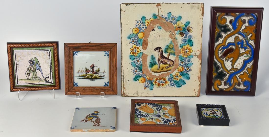Seven Early Delft Tiles: All polychrome painted, including large tile with dog in landscape with floral surround, 10 3/4 x 13"; plus one with bird and floral scroll work that is likely Persian, 5 1/2" x 11"; plus one with kne