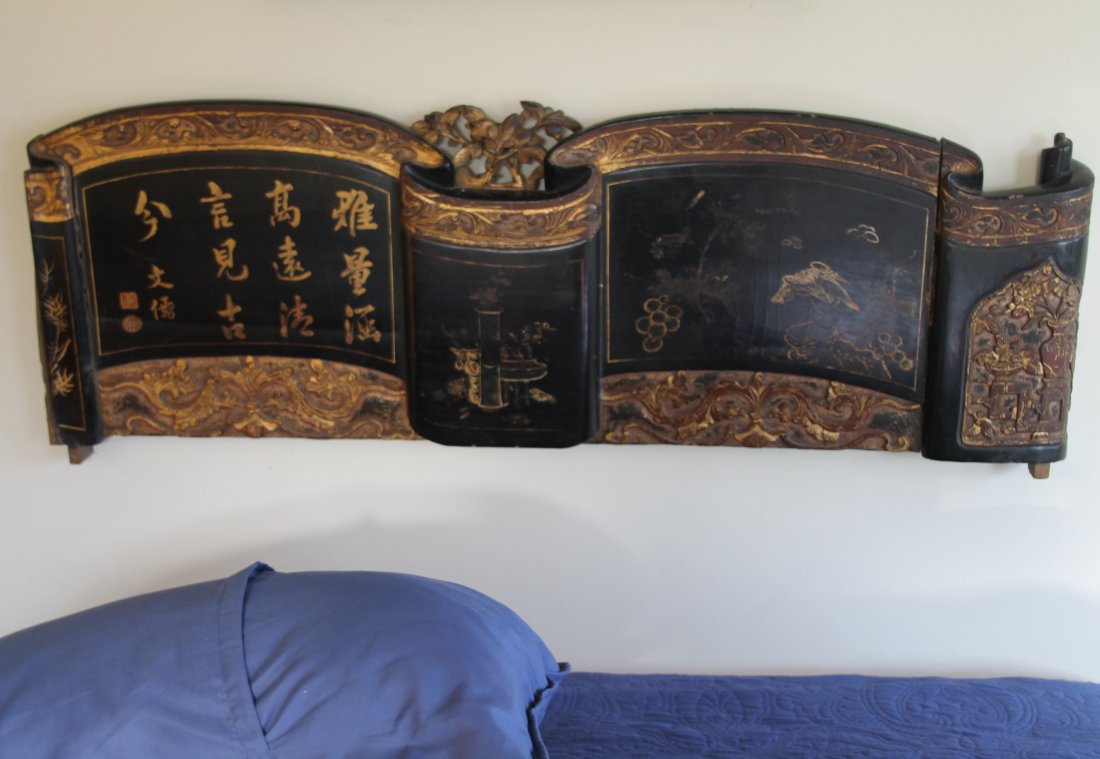 Large Chinese Wooden Carved Scroll: Heavily carved wooden and painted hanging décor, in form of a scroll, was used as a headboard for bed. 19th century.16"h. x 47"w.