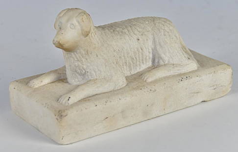 19th Century Marble Folk Art Sculpture of Dog: White marble, circa 1870's of long haired dog lying on ground, unusual as it's head is raised, on plinth, 4" x 8" x 4" high. Condition Fine.