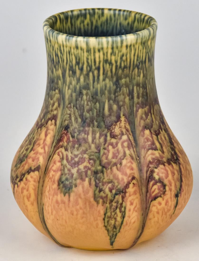 Rookwood Vase by M.H. McDonald: Wax matt with stylized flowers in red, green & blue on yellow ground, lobed body. Marked on base with Rookwood symbol. Dated 1929. Shape number 6101 with incised initials MHM. 5" high, marked second o