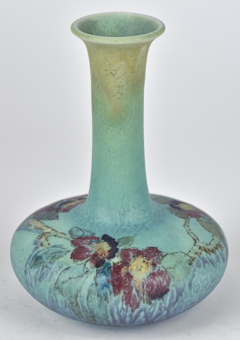 Rookwood Vase by Helen Lyons: Wax Matt with stylized floral painting in rose, purple, yellow, blue/green and brown on mottled green ground. Marked on base with Rookwood symbol. Dated 1924. Shape number 2716 painted artist initials