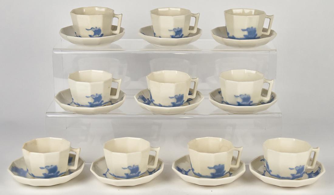 Ten Roowood Cups & Saucers: All with Viking ship motif in blue, marked with RP and no flames with M-10 (cups) & M-7 (saucer), saucers are 4 1/2" diameter. Condition All Fine.